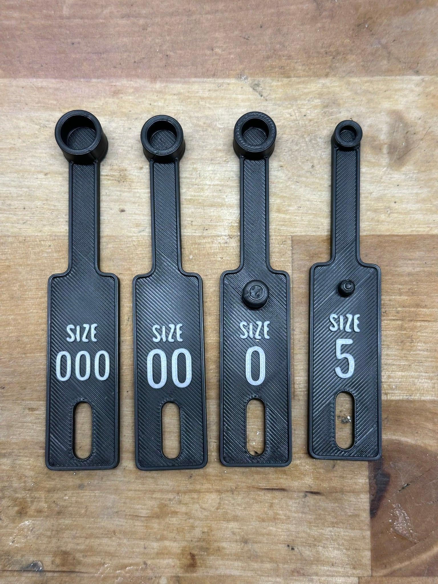 Capsule filler scoop set in multiple sizes for filling empty capsules