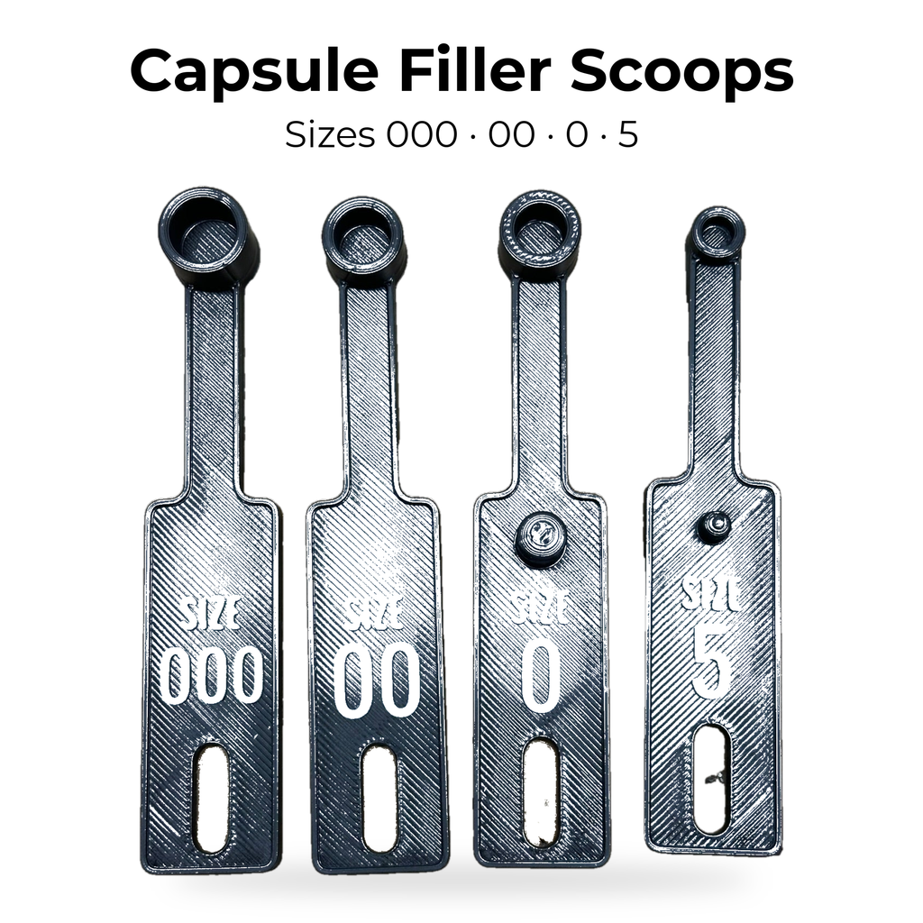 Capsule filler scoops in sizes 000, 00, 0 and 5 on a white background